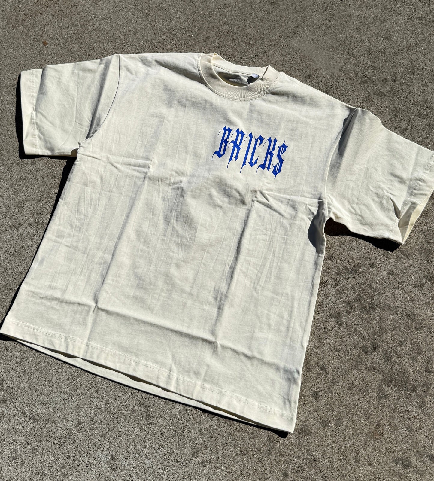 CREAM BRICK$ TEE